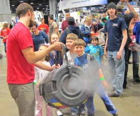 Movement of air through a smoke cannon attracts fascinated crowds