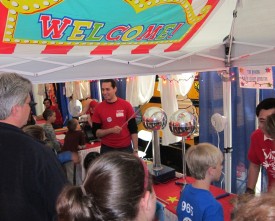 Visitors so excited with the Van de Graaff generators, their hair stood on ends!