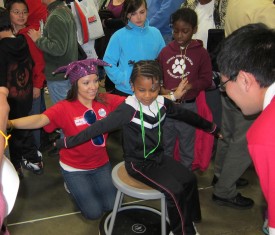 Visitors learn about gyroscopic forces in a rotating chair